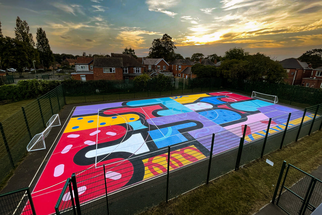 Coo-Var Suregrip Anti-Slip Floor Paint applied to a painted sports court.
